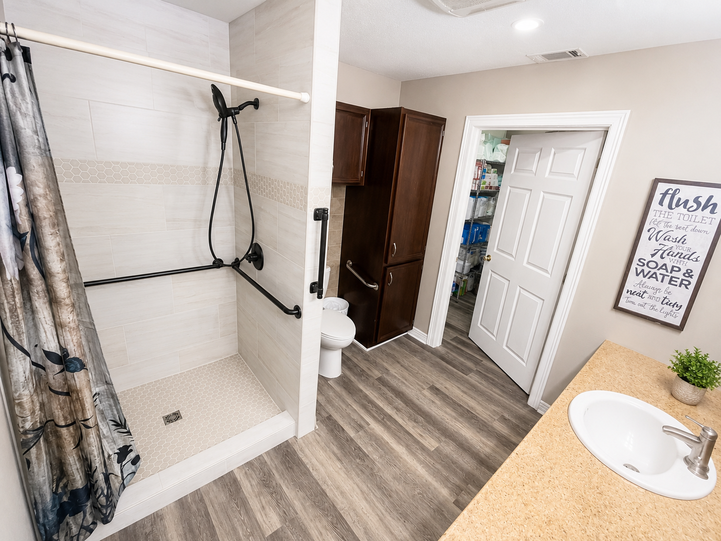Accessible bathroom with walk-in shower at Stonewood Senior Living