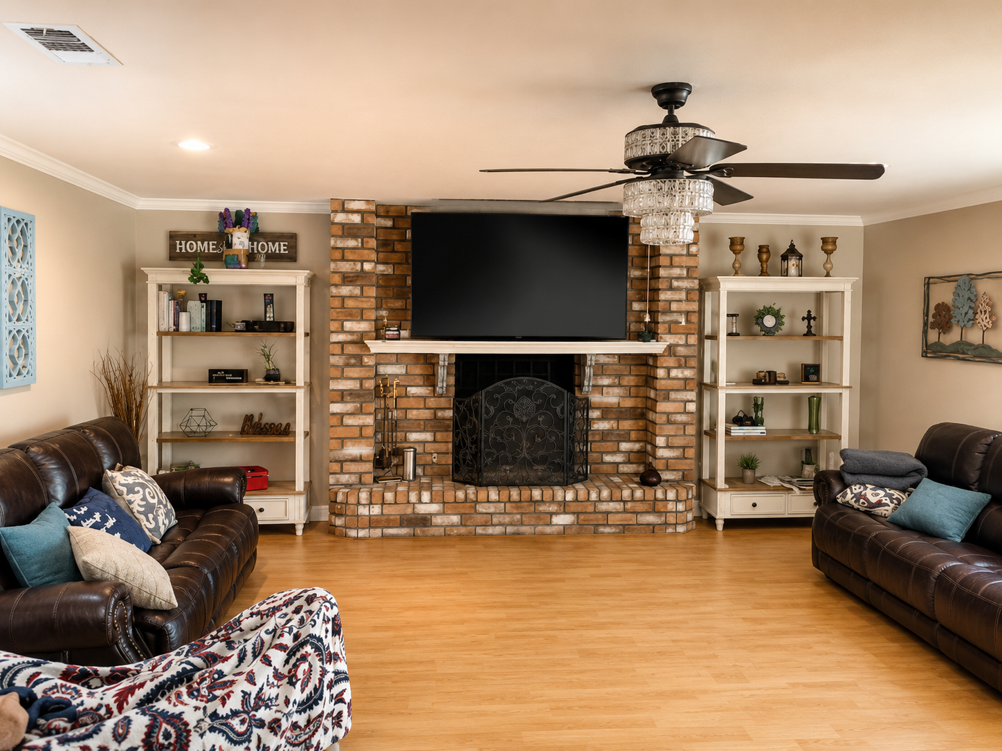 Brick fireplace living room at Stonewood Senior Living