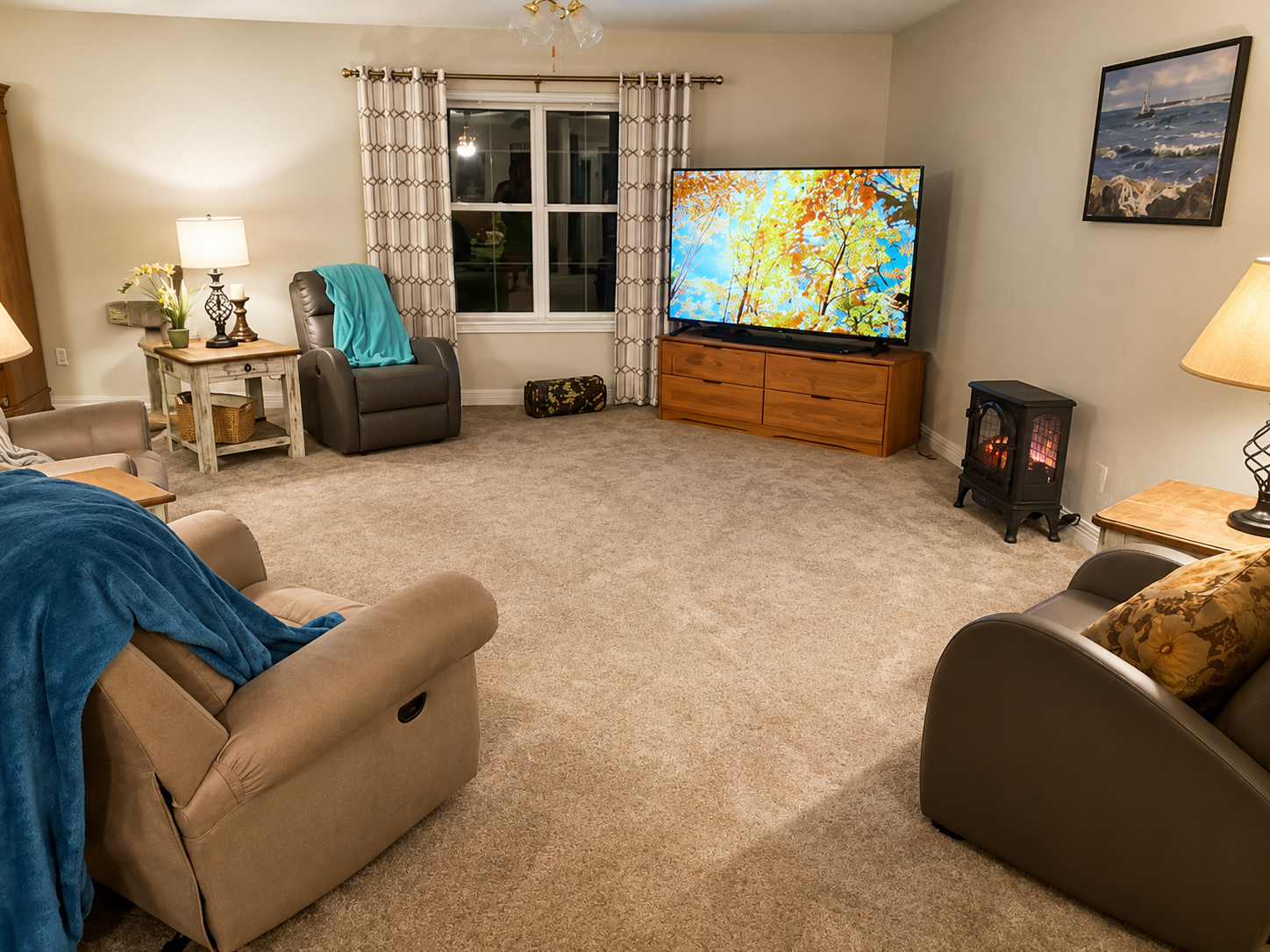 Cozy evening living room at Stonewood Senior Living